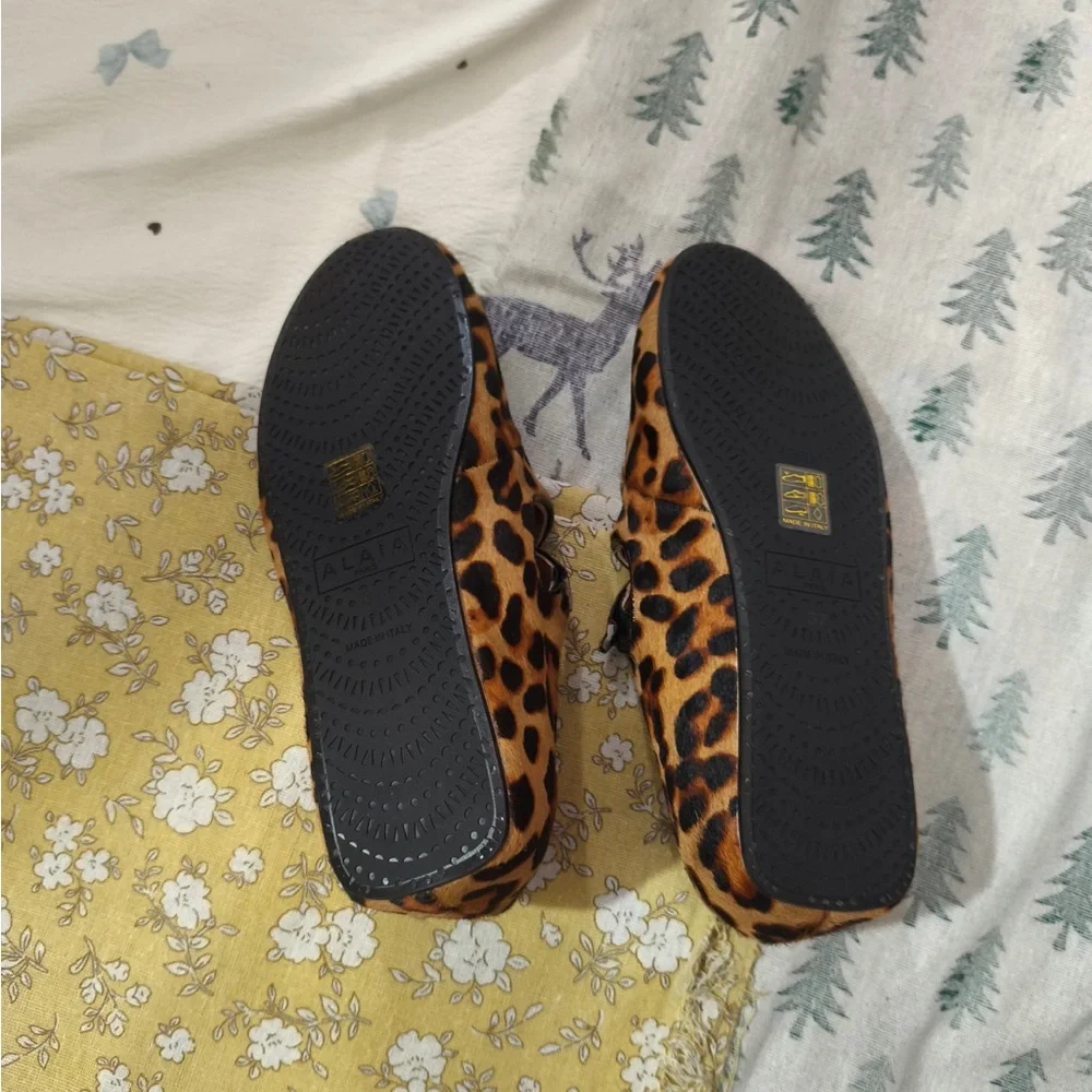 Alaia Leopard-Print Mary Jane Flats in Brown and Black